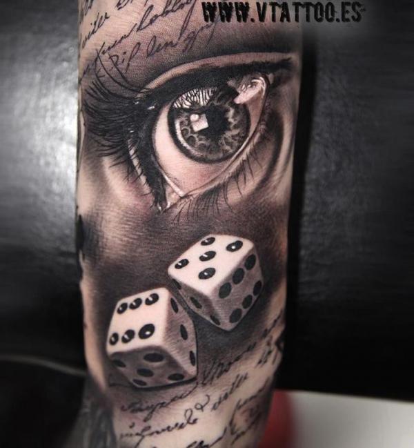 Realistic dice and eye tattoo