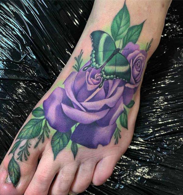 Realistic purple rose foot tattoo