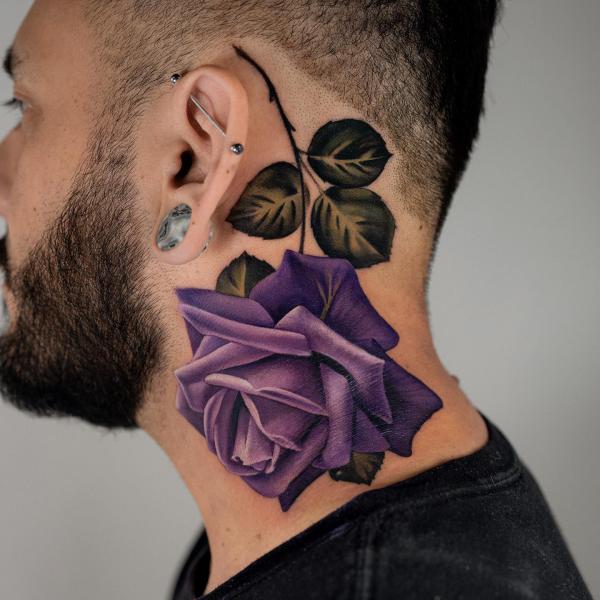 Realistic purple rose tattoo on neck