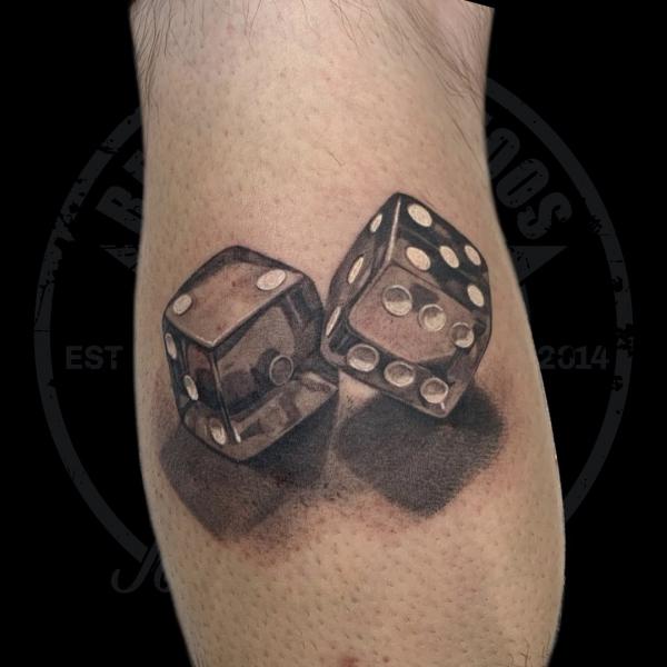 Realistic two dices tattoo