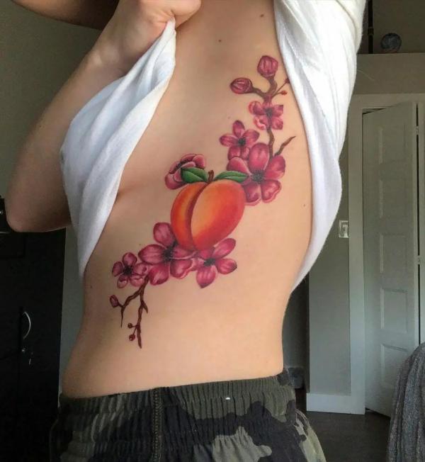 Red peach branch with flowers and peach tattoo