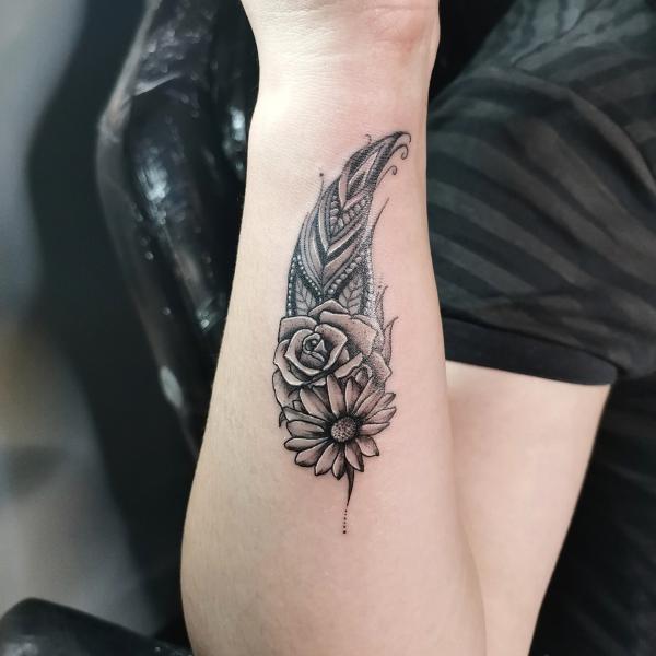 Rose and daisy feather tattoo