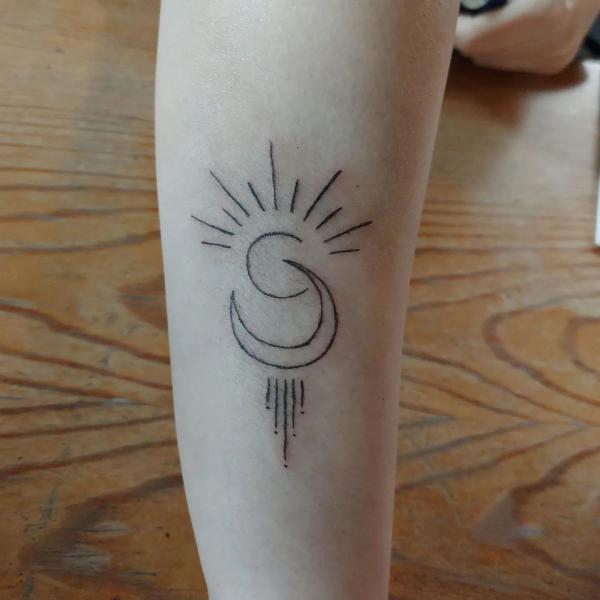 Simple Sun and moon line work tattoo