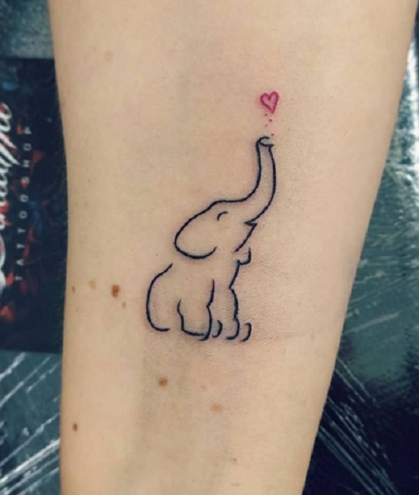 Simple elephant tattoo on arm