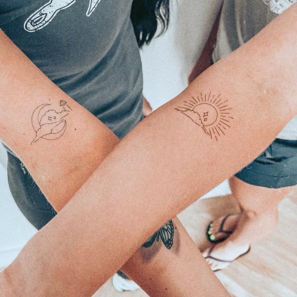 Simple sun and moon outline tattoo