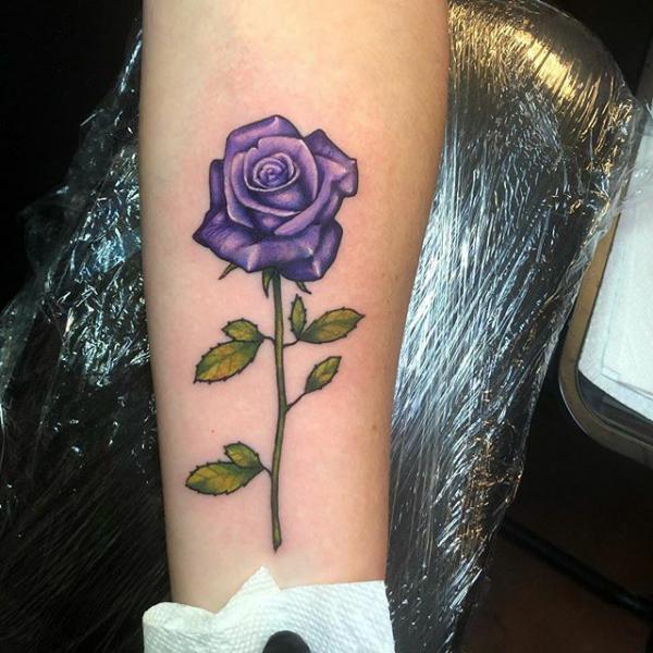 Single purple rose with stem tattoo