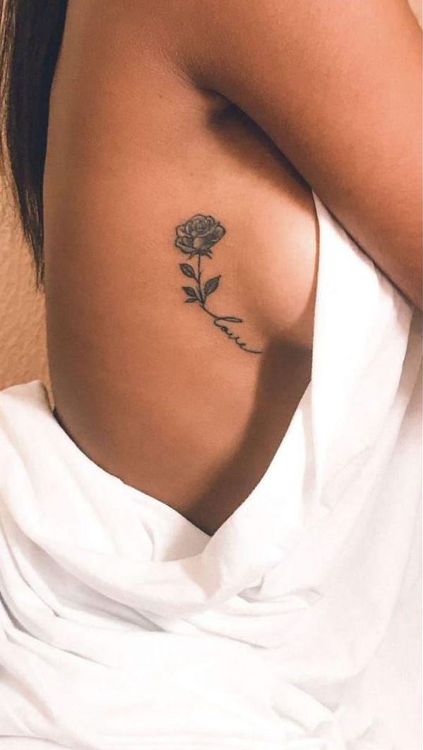 Small rose with name side boob tattoo