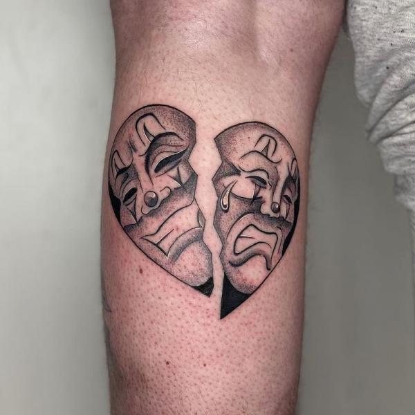 Smile and cry broken heart tattoo