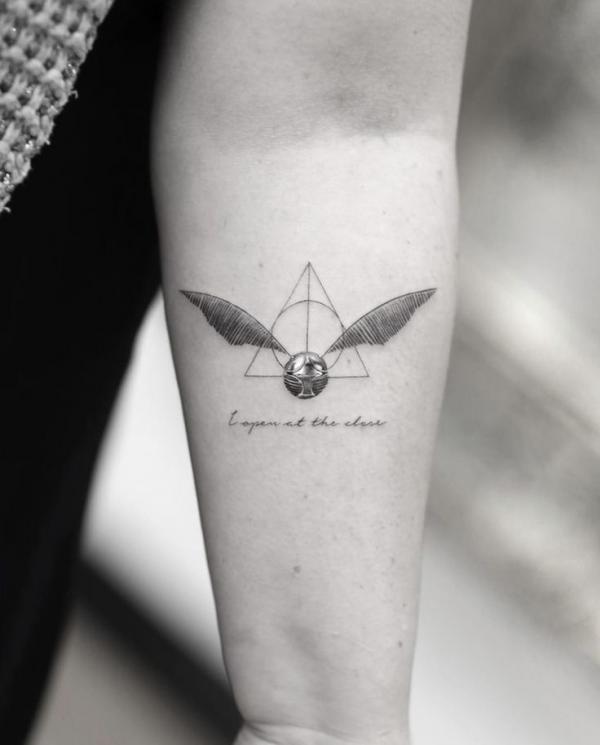Snitch and deathly hallows tattoo with the quote I open at the close