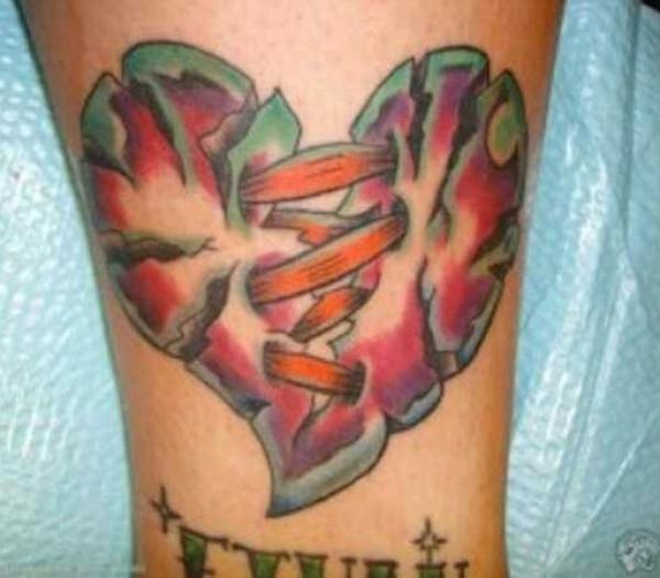 Stitched broken heart tattoo traditional