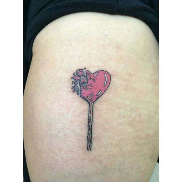 Stitched broken heart tattoo