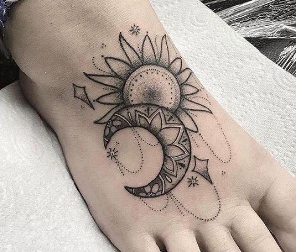 Sun and mandala moon foot tattoo