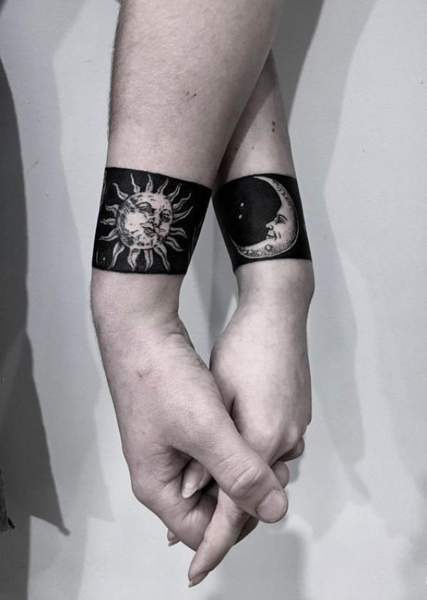 Sun and moon armband tattoo