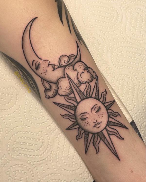 Sun and moon faces with clouds tattoo