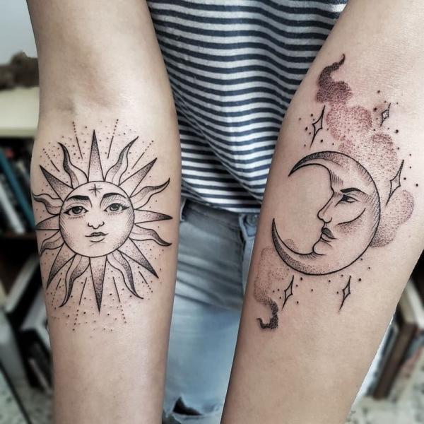 Sun and moon with stars tattoo