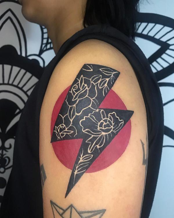 Sun shoulder tattoo floral lightning bolt