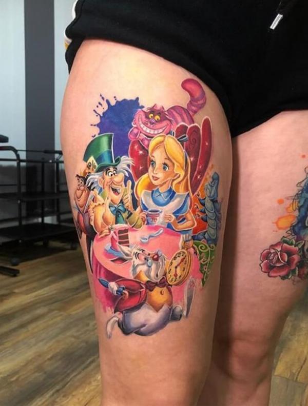 The Tea Party tattoo on thigh