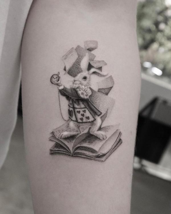 The white rabbit on a book dotwork