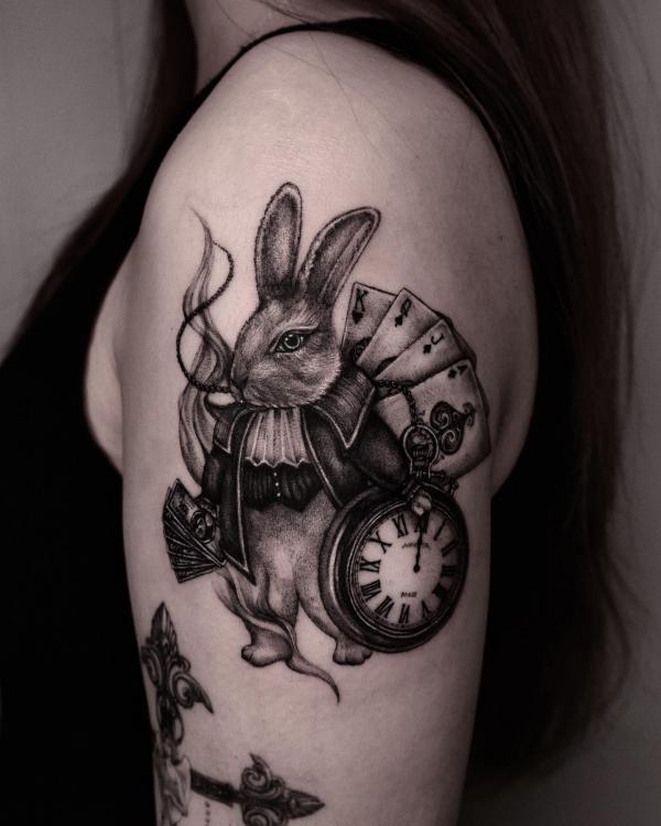 The white rabbit with clock and cards blackwork