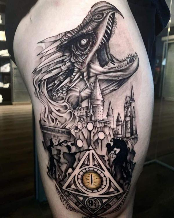 Thestrals hogwarts and deathly hallows tattoo on thigh