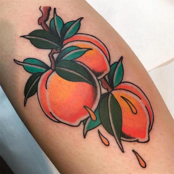 Three dripping peach tattoo