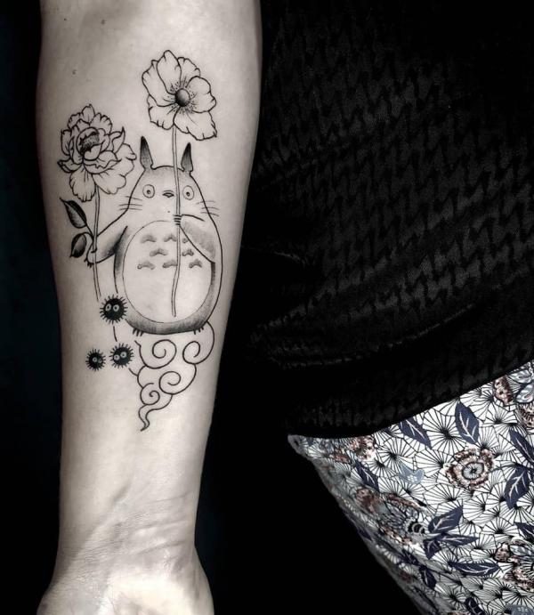Totoro holding flowers with Susuwatari tattoo