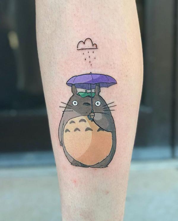 Totoro with an umbrella in the rain tattoo