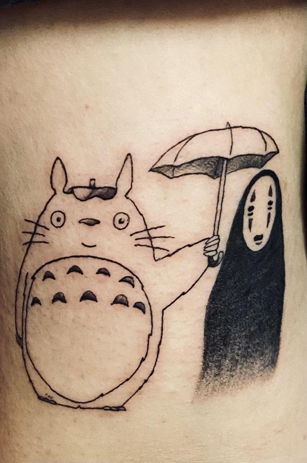 Totoro with umbrella and No Face tattoo