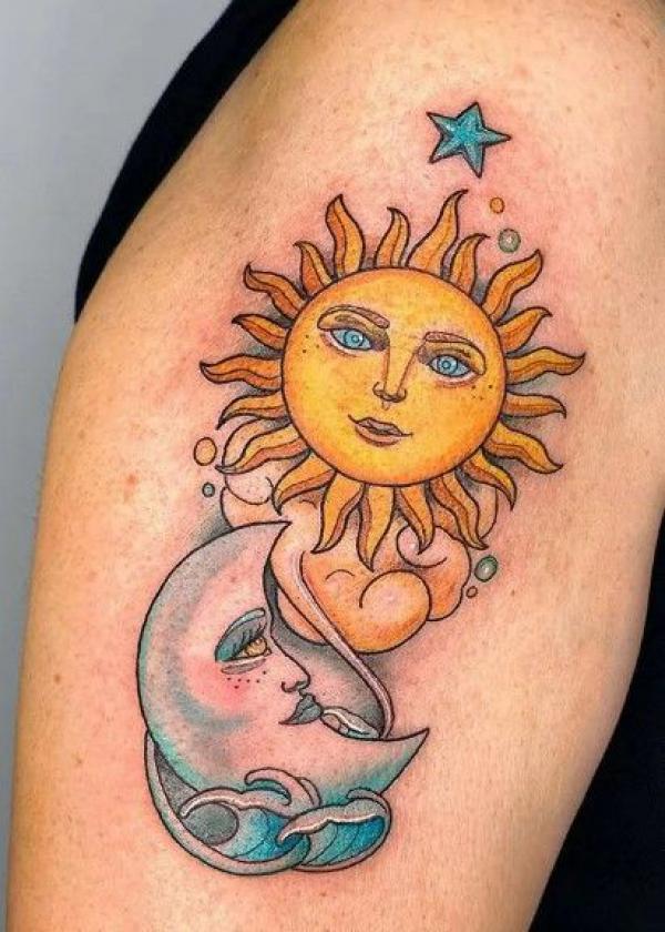 Traditional sun and moon face with star tattoo