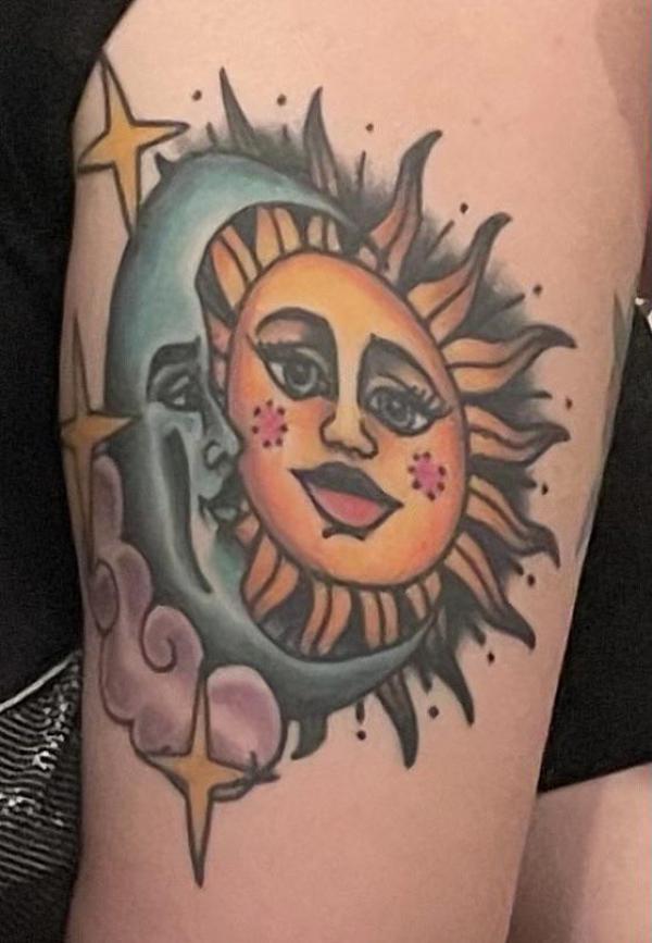 Traditional sun and moon tattoo