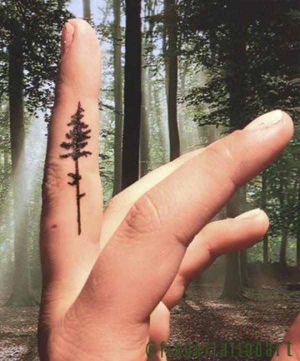 Tree finger tattoo