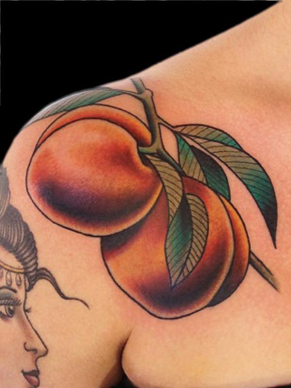 Two traditional peach tattoo on shoulder