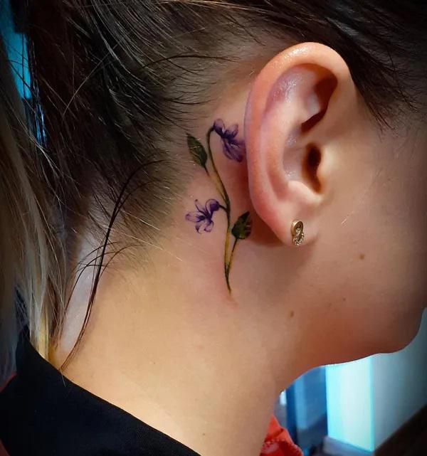 Violet Tattoo Behind the Ear