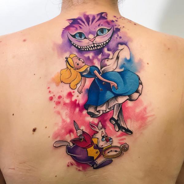 Watercolor Alice in Wonderland back tattoo