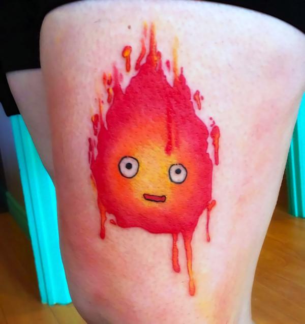 Watercolor Calcifer thigh tattoo