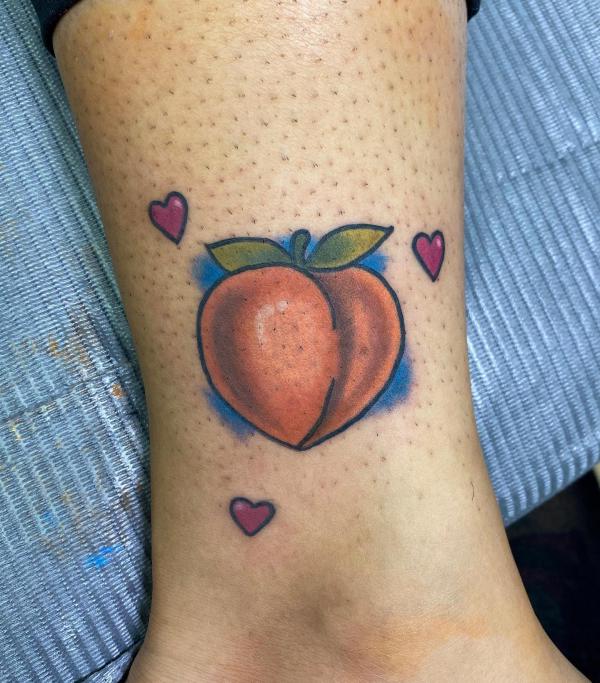 Watercolor Peach and hearts tattoo