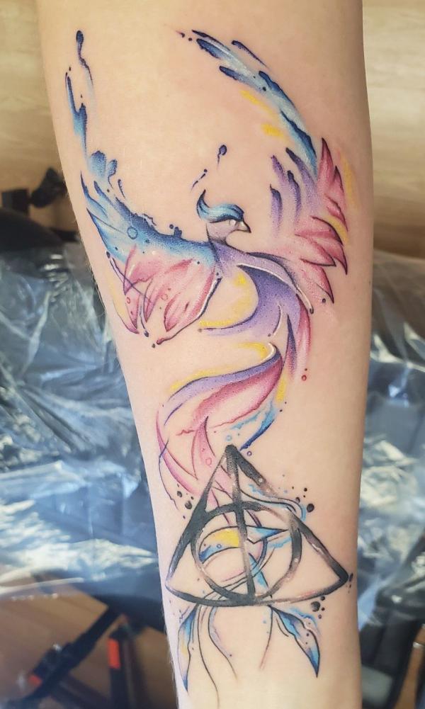 Watercolor deathly hallows and phoenix tattoo