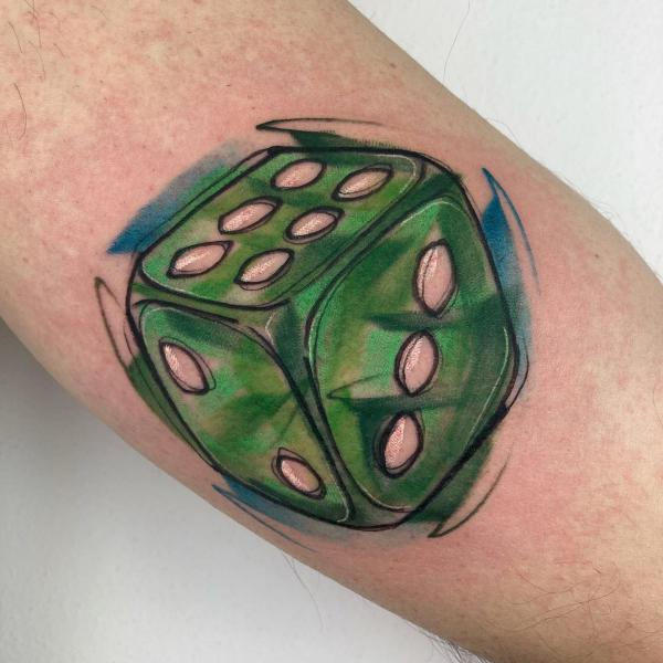 Watercolor dice tattoo arm