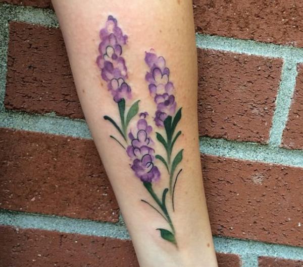 Watercolor lavender forearm tattoo