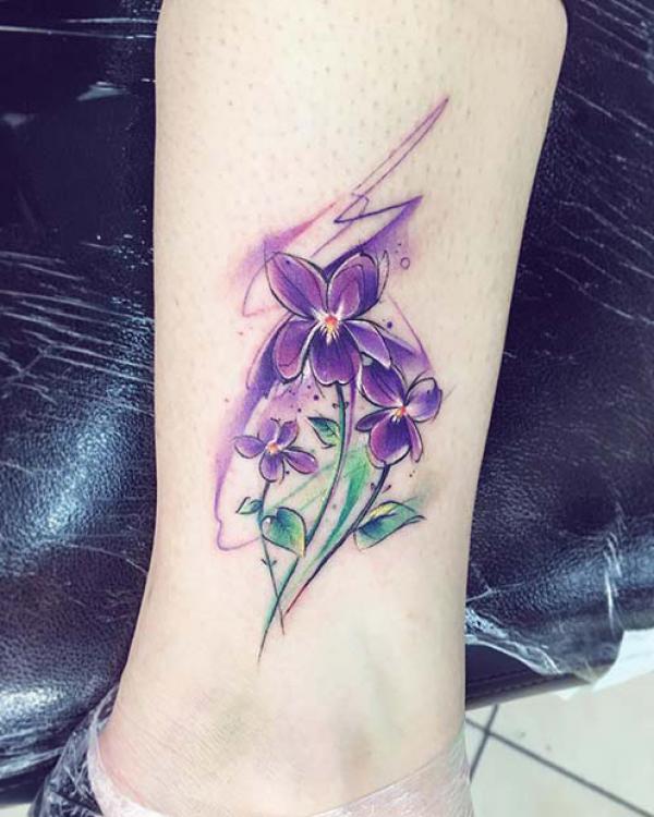 Watercolor violet ankle tattoo