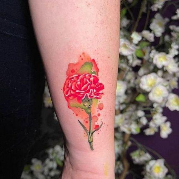 Watercolor carnation tattoo