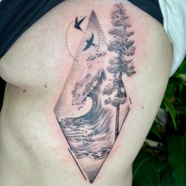 Wave and tree side boob tattoo