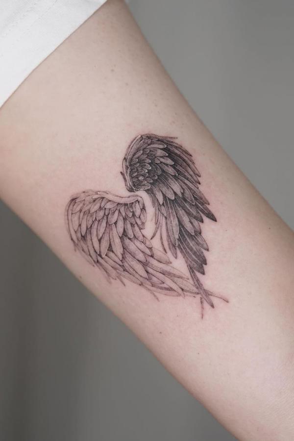 Wings broken heart tattoo