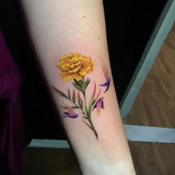 Yellow carnation tattoo
