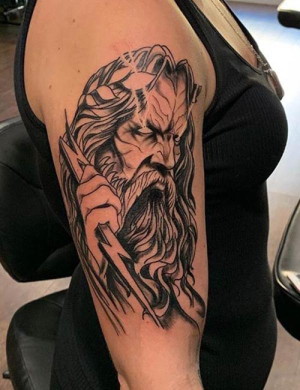 Zeus thunderbolt upper arm tattoo