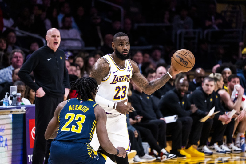 LOS ANGELES, CA - MARCH 24: LeBron James #23 of the Los Angeles Lakers handles the ball during the game against the Indiana Pacers on March 24, 2024 at Crypto.Com Arena in Los Angeles, California. NOTE TO USER: User expressly acknowledges and agrees that, by downloading and/or using this Photograph, user is consenting to the terms and conditions of the Getty Images License Agreement. Mandatory Copyright Notice: Copyright 2024 NBAE (Photo by Tyler Ross/NBAE via Getty Images)