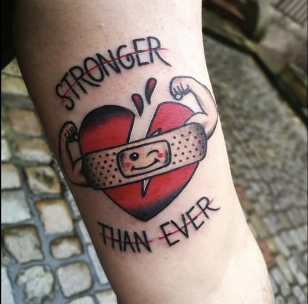 broken heart with bandaid tattoo with words Stroger than ever