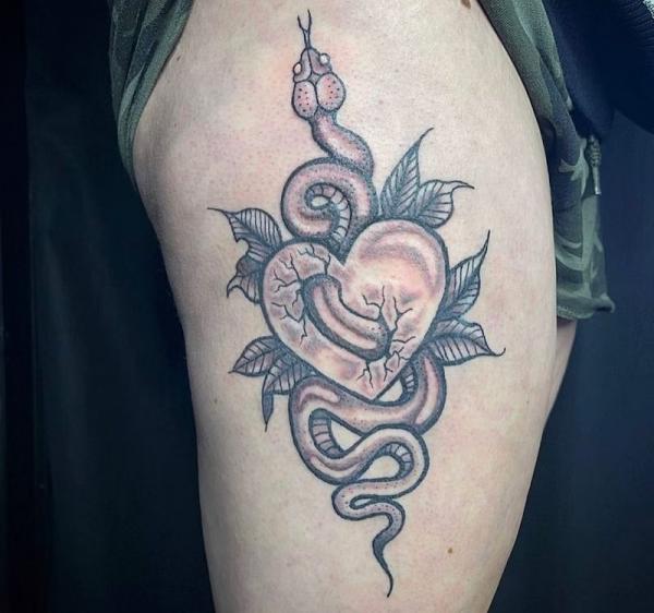 broken heart with snake tattoo