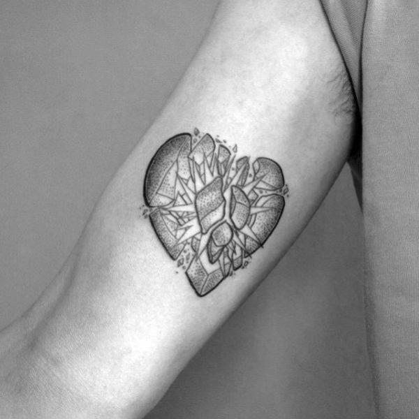 burst heart tattoo black and grey