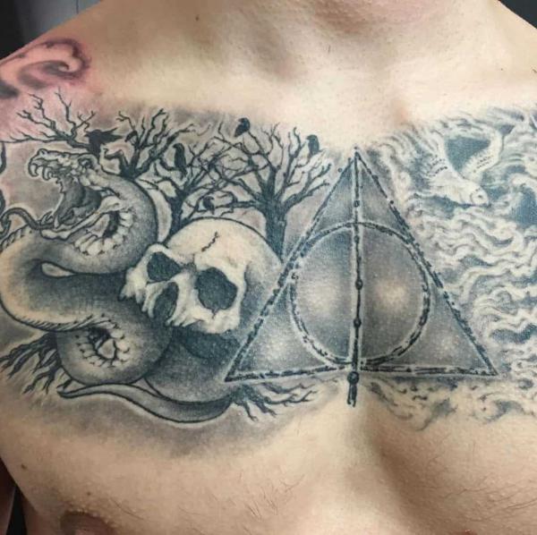 death eater and deathly hallows chest tattoo black and grey